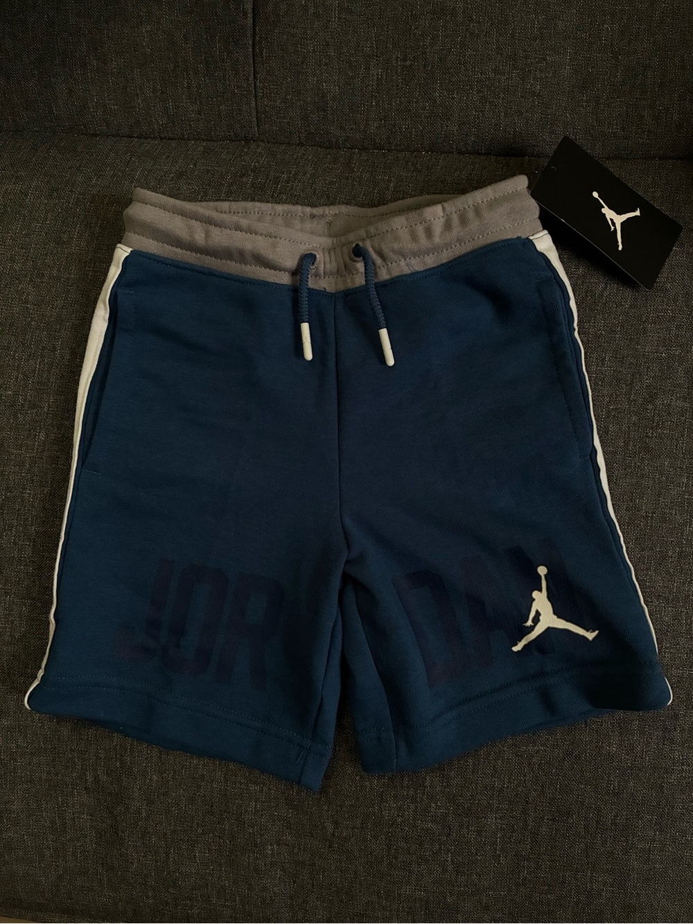 Jordan Navy Blue Shorts with Gray Waistband and White Side Stripes